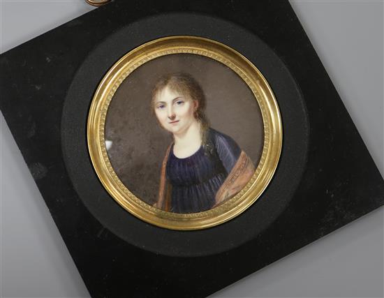 A 19th century French oil on ivory miniature of a lady, 6.5cm, later framed